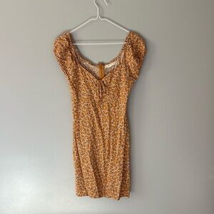 Aeropostale Dress XS Mustard Yellow.  Zip up back. White flowers. Tie in front.
